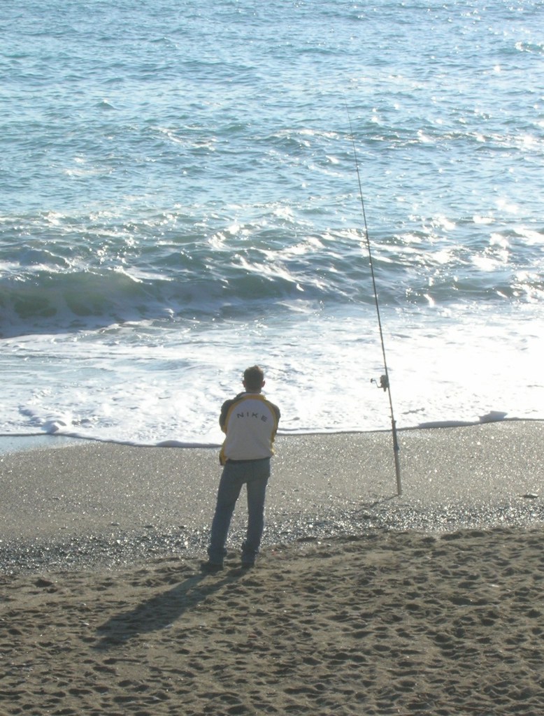 pescatore dalla riva