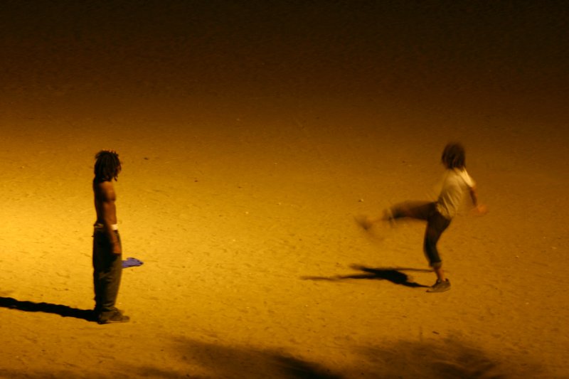 Guys on Barcelona beach