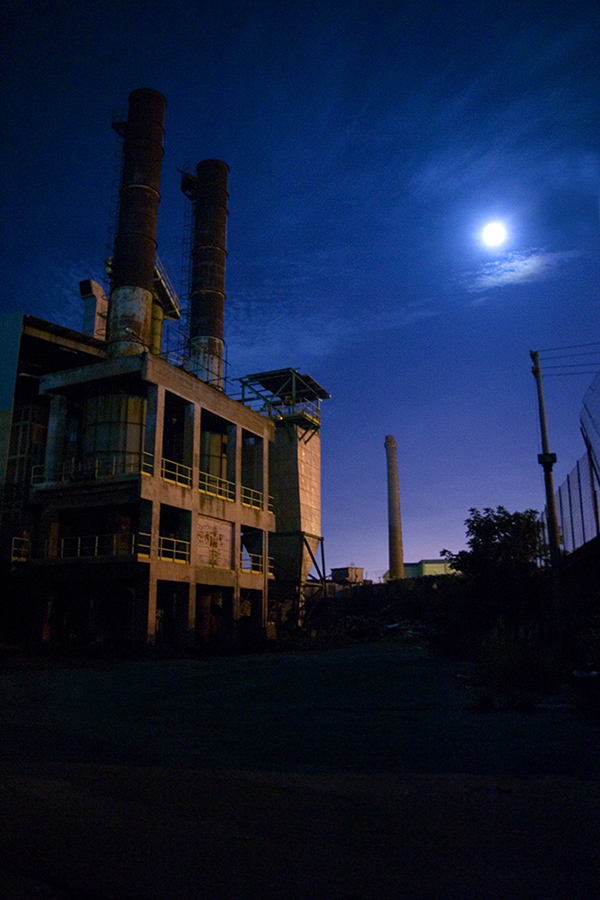 Moon-shining over the factory
