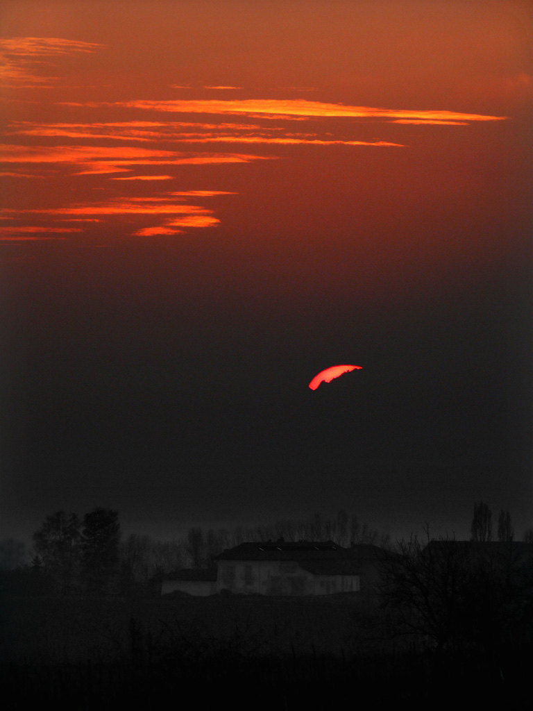 Tramonto su cascine
