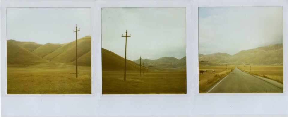 Waste land. Only a human sign: a cross