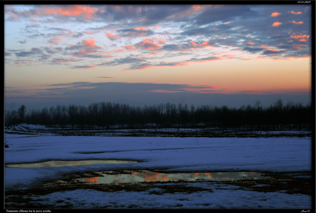 Tramonto sulla neve sciolta