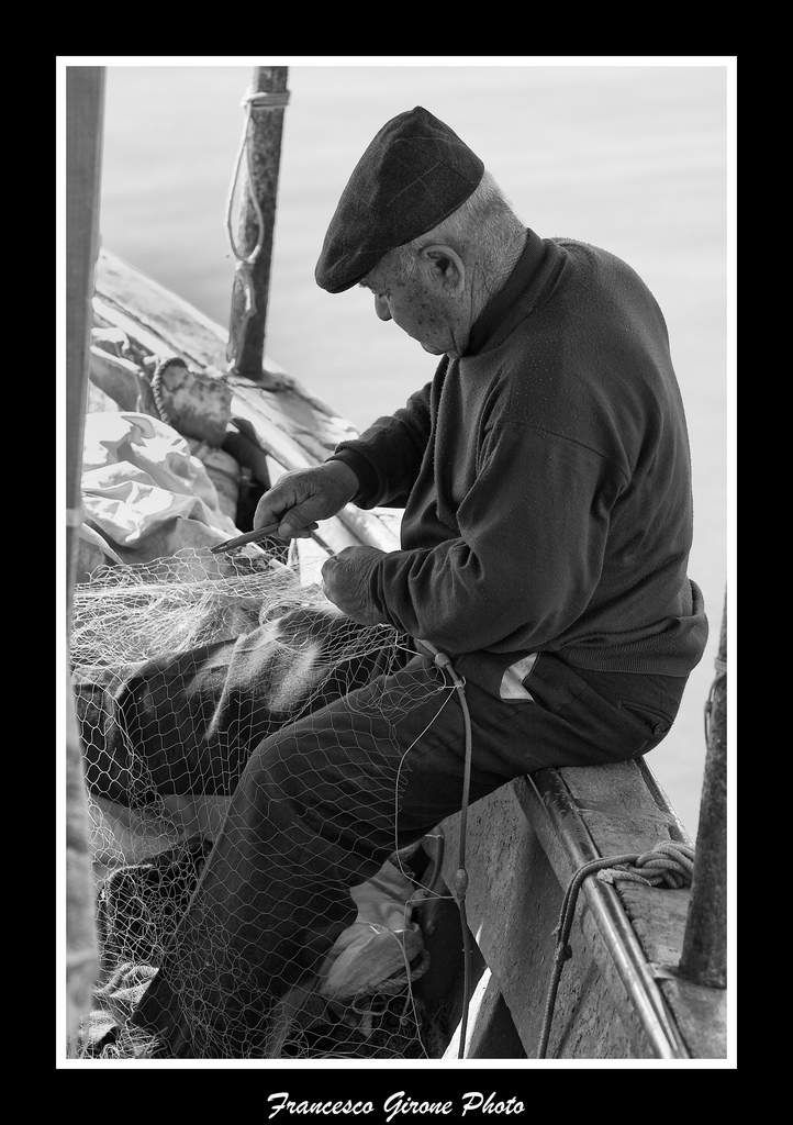 Riparazione reti pesca