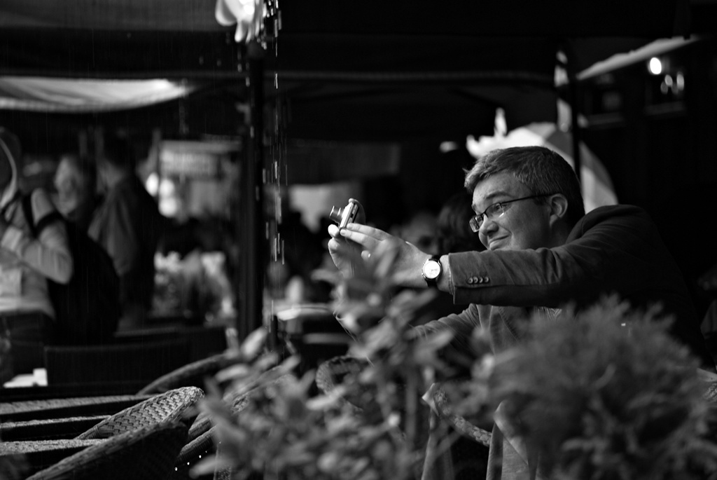 I'M TRYING TO STOP THE RAIN WITH A PICTURE