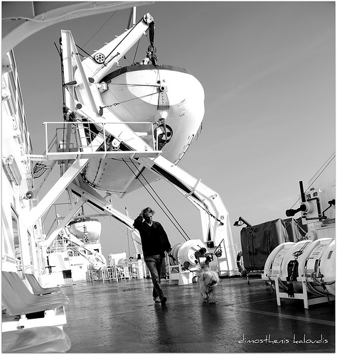 man with his dog, on board