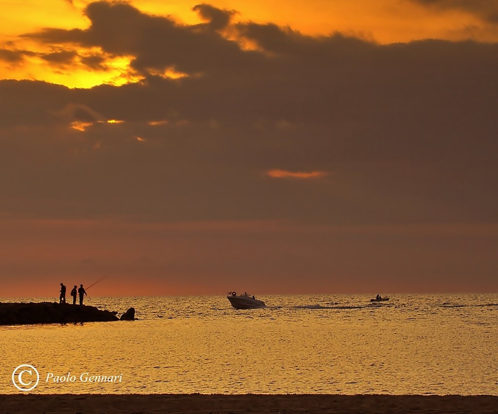 pescatori al tramonto