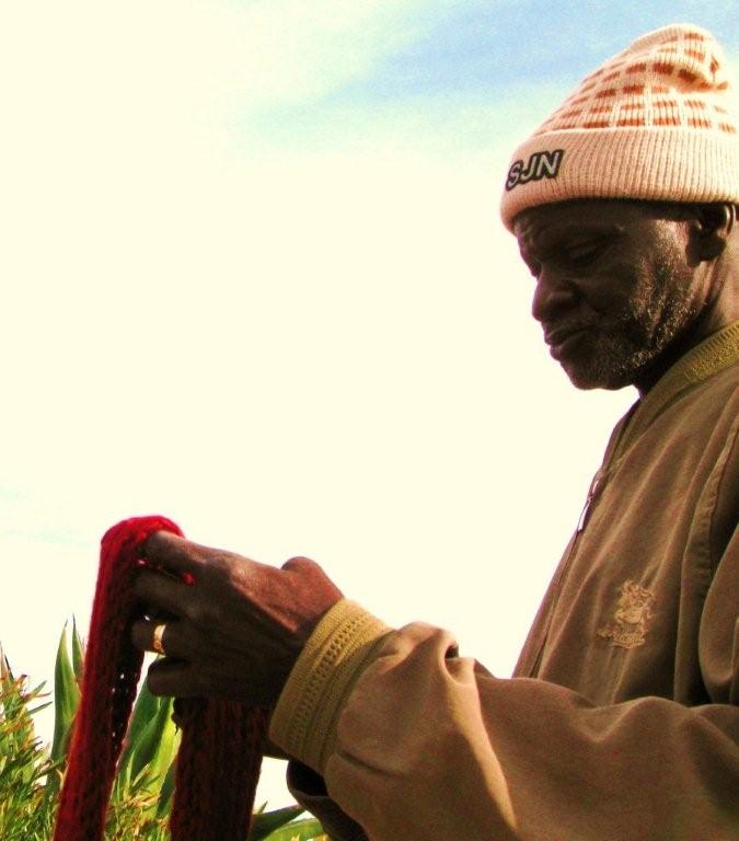 Venditore ambulante di sciarpe