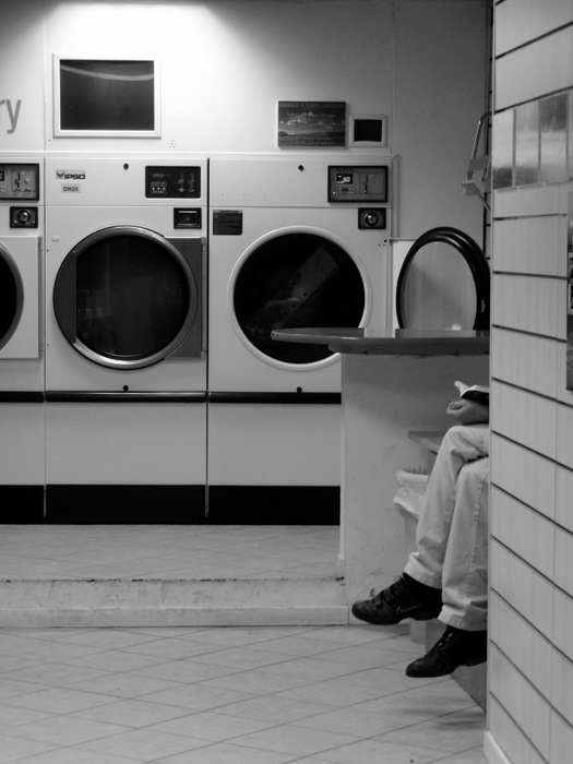 waiting at the automatic laundry