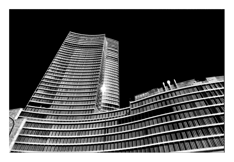 black sky, silver building