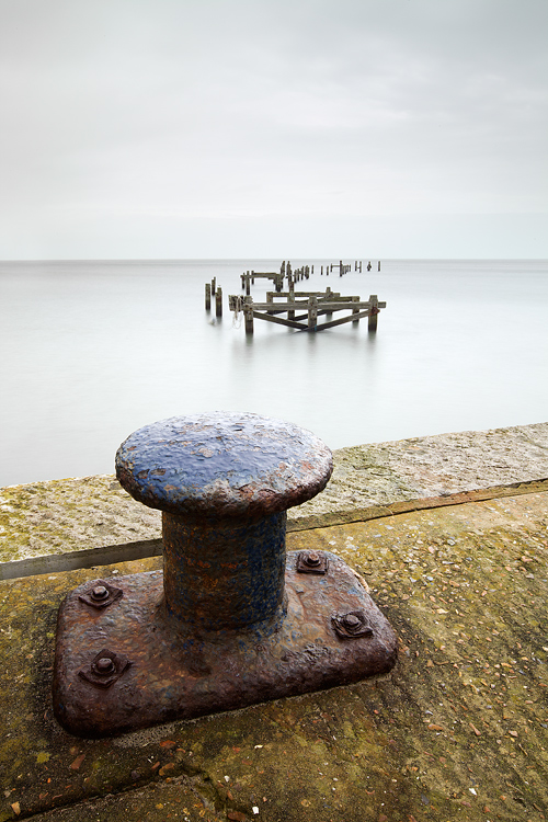 The enduring bollard and the ruined pier