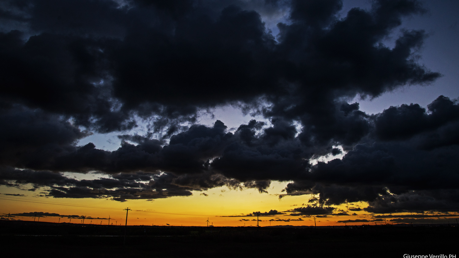 Large clouds at sunset