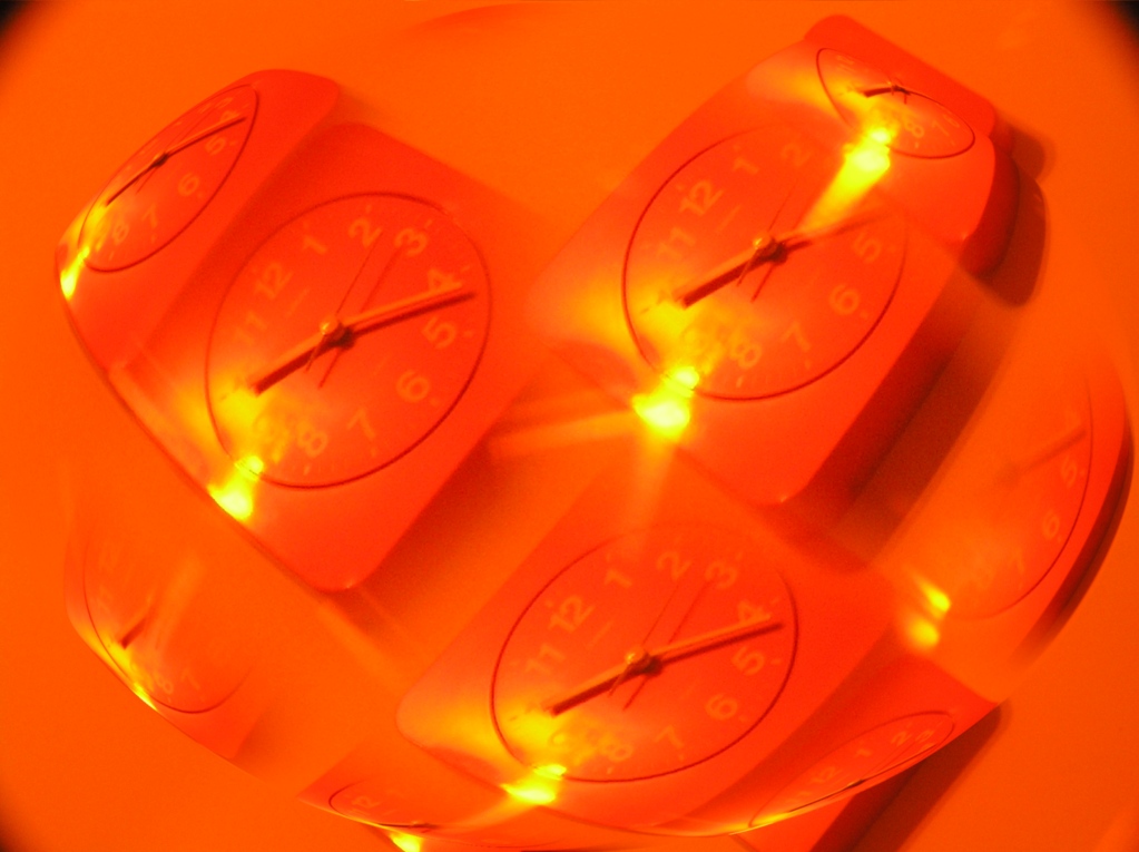 Clock heart orange.