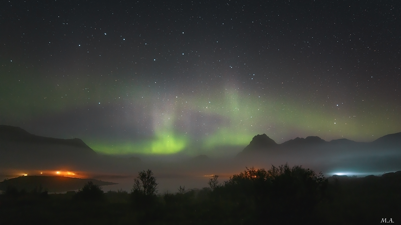 Lights and fog on the fjord