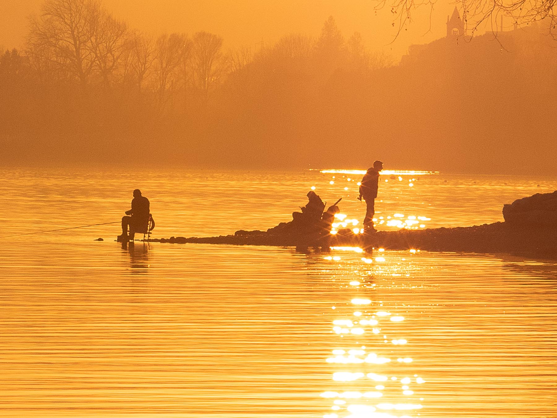 pescatori al tramonto