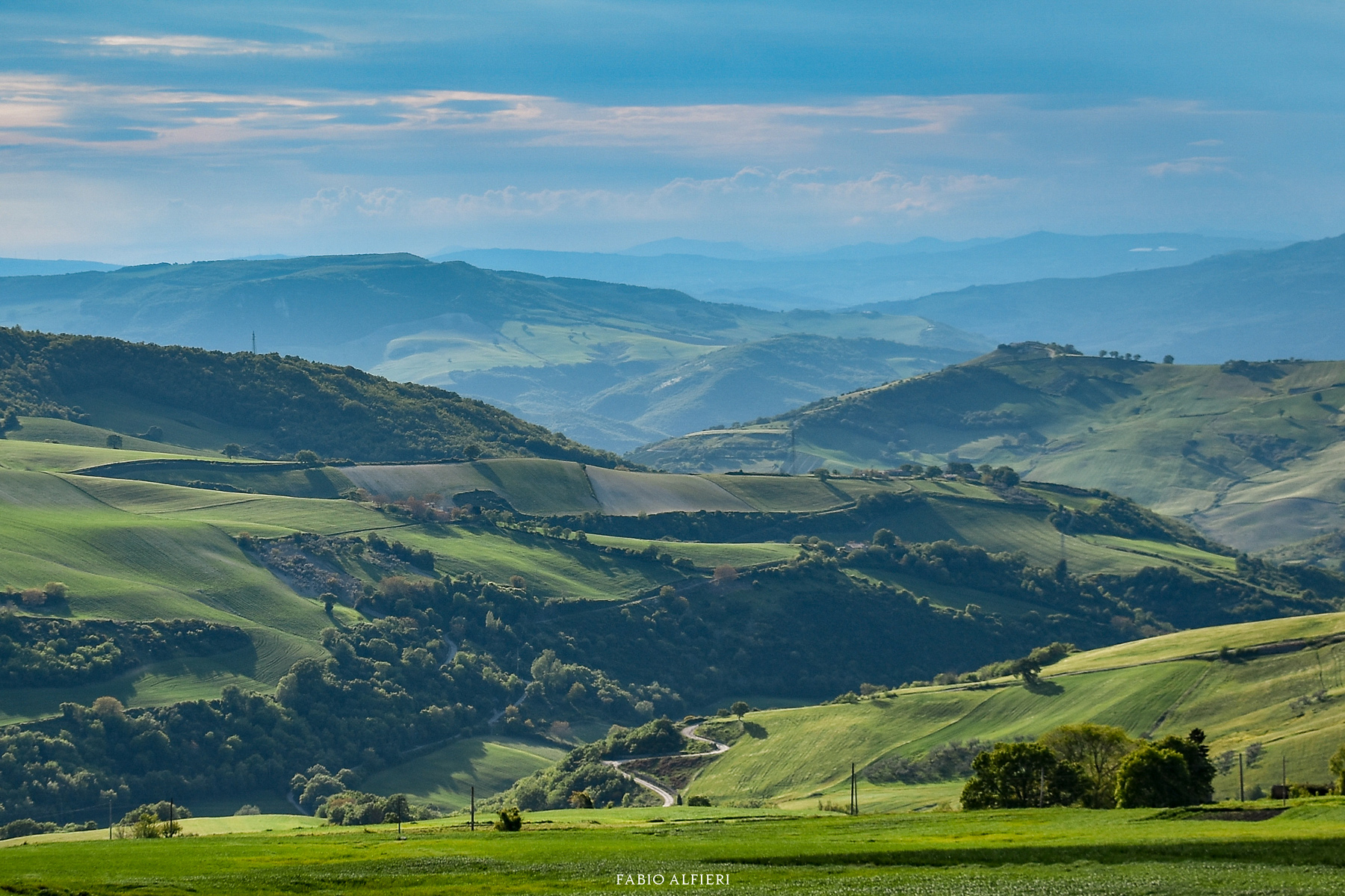 Green hills and mist