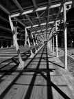 A lonely man in a cage of shadows and steel... A lonely man in a cage of shadows and steel...