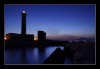 Faro di Augusta - SR - a destra l'Etna Faro di Augusta - SR - a destra l'Etna