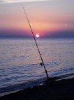 tramonto durante una battuta di pesca