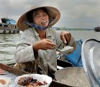 Vendendo riso nel delta del Mekong Vendendo riso nel delta del Mekong