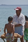 Venditore di Krapfen in spiaggia......