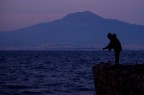 Pescatore e Vesuvio