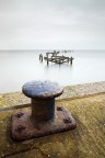 The enduring bollard and the ruined pier The enduring bollard and the ruined pier