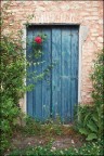 Valsanzibio. Porta chiusa con rosa. Valsanzibio. Porta chiusa con rosa.