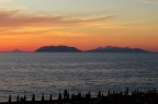 Beach sunset with islands Beach sunset with islands