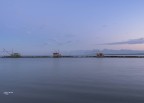 Alba rosea sui trabucchi.Marina di pisa. Alba rosea sui trabucchi.Marina di pisa.