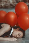 Red balloons and sand Red balloons and sand