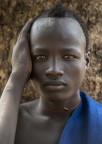 Ragazzo etiope di etnia Mursi